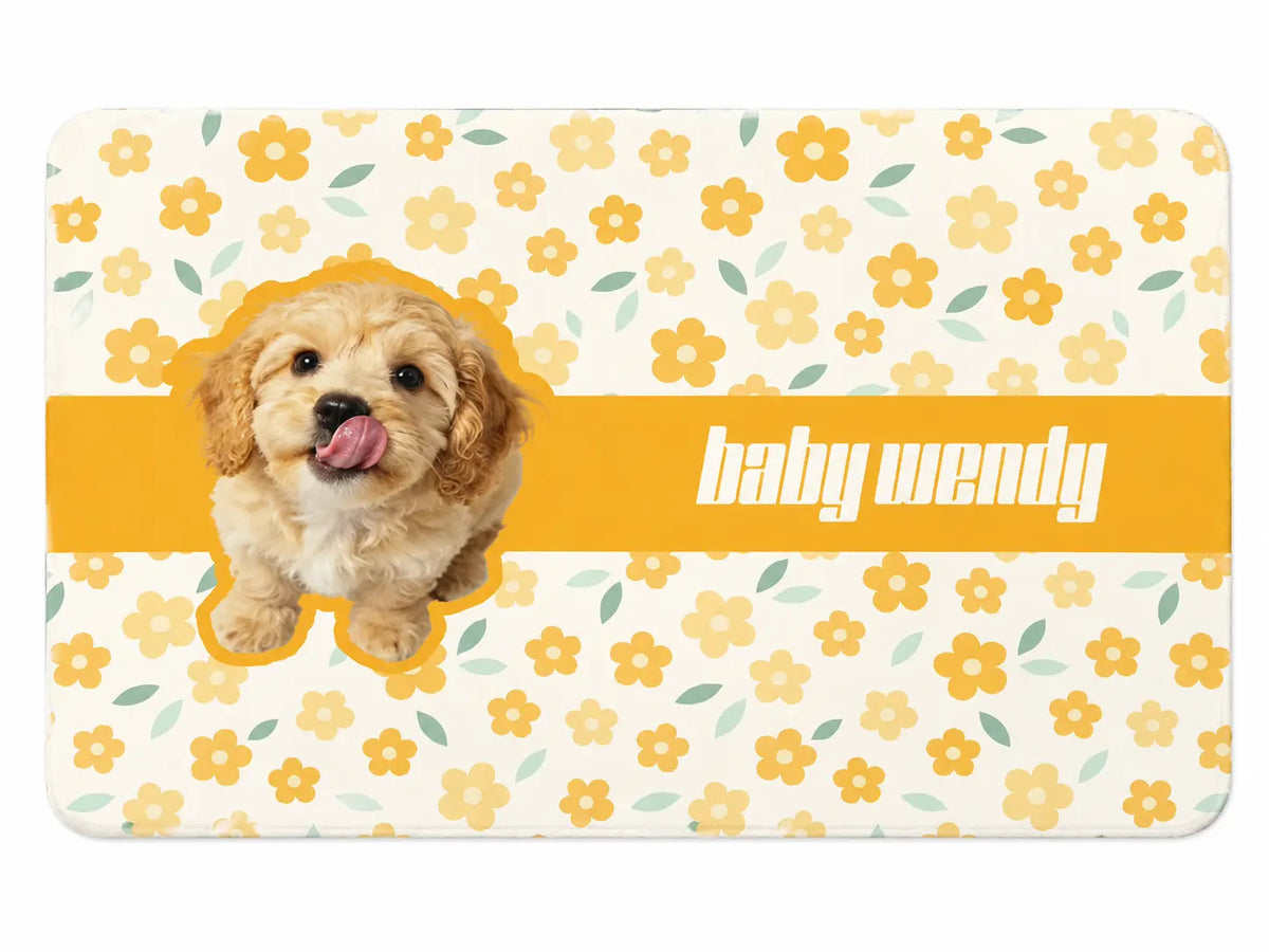 Custom waterproof PU leather pet feeding mat featuring yellow floral blossom pattern and personalized dog photo with name