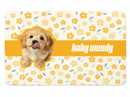 Custom waterproof PU leather pet feeding mat featuring yellow floral blossom pattern and personalized dog photo with name